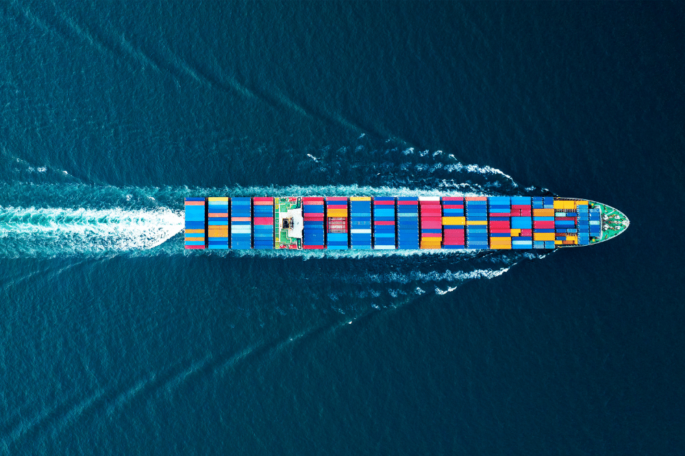 Shipping Boat with Containers on The Sea